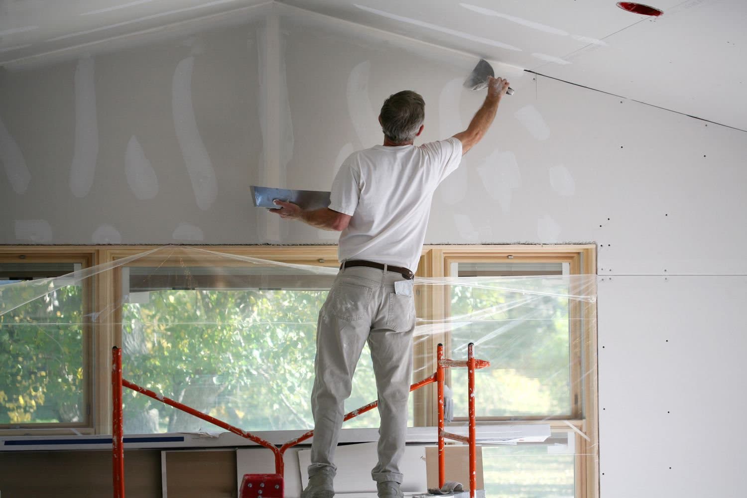 Joint compound applied to drywall seams on a Toro R Services project in Logan, Utah