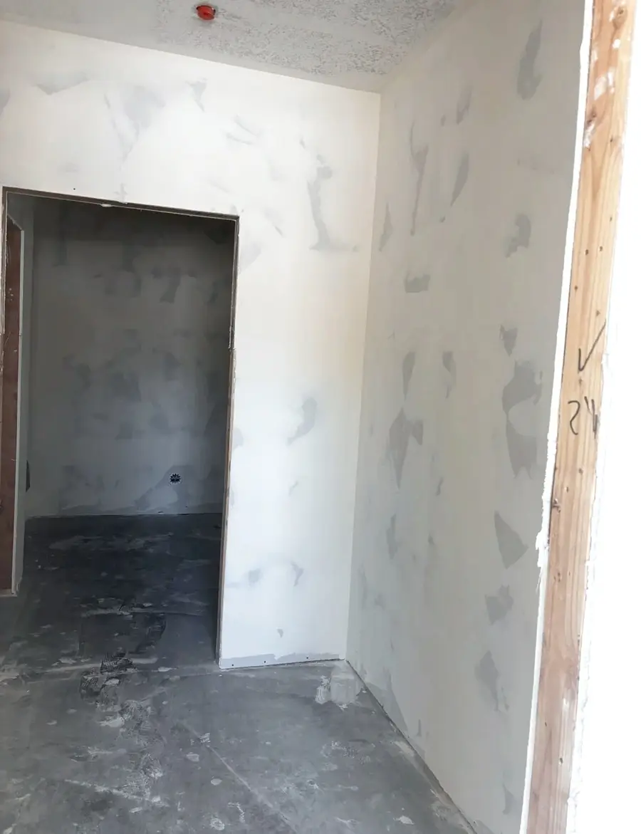 Drywall taped and mudded around a doorway, ready for finishing in Cache Valley, Utah