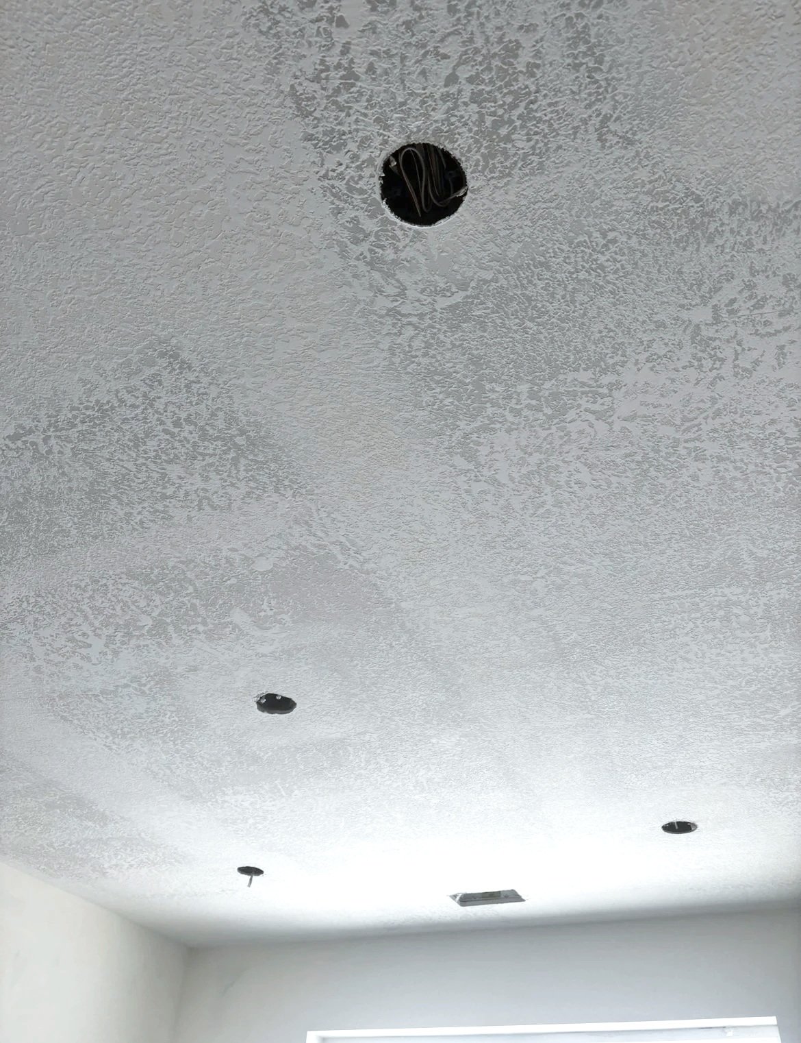 Smooth knockdown ceiling texture finished by Toro R Services in Cache Valley, Utah